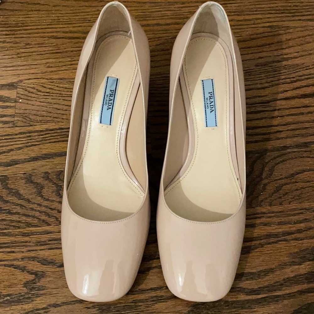 Authentic Prada pumps. In great condition - has scuff mark on the side of shoe